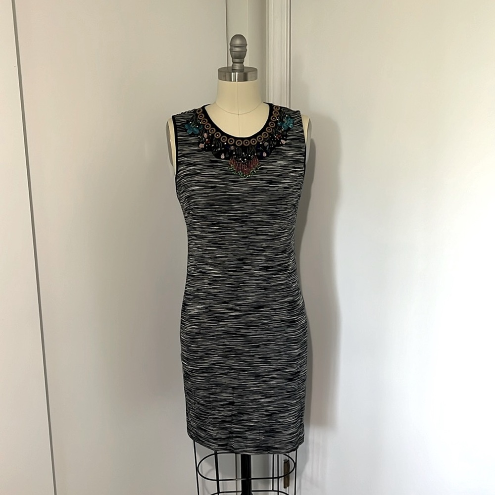 Dress with neck beading appliqué